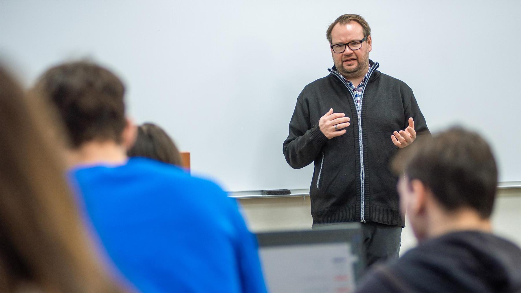 A professor teaching a business class